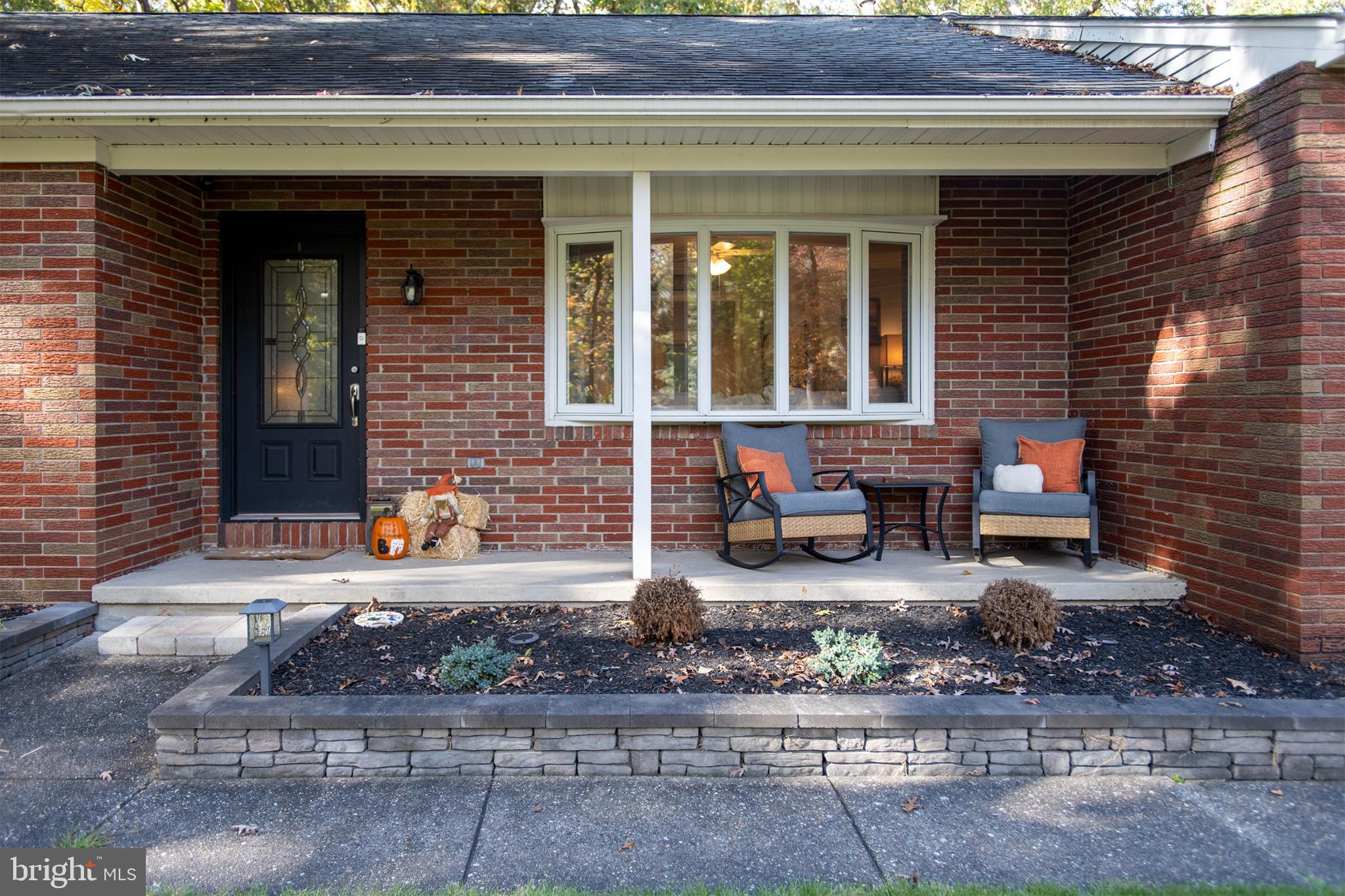 32 Ohio Trail Medford, NJ 08055 - Photo 2 of 25 a front view of a house with garden