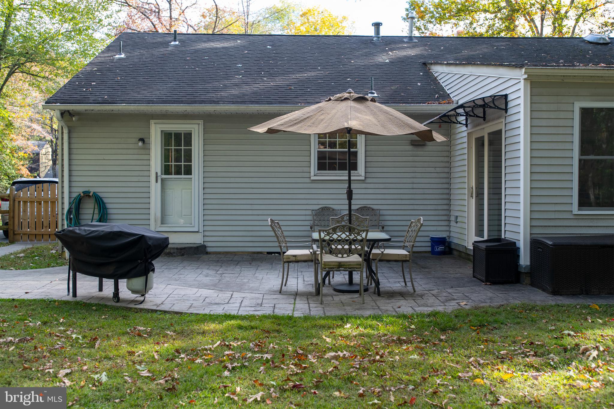 32 Ohio Trail Medford, NJ 08055 - Photo 22 of 25 a backyard of a house with table and chairs