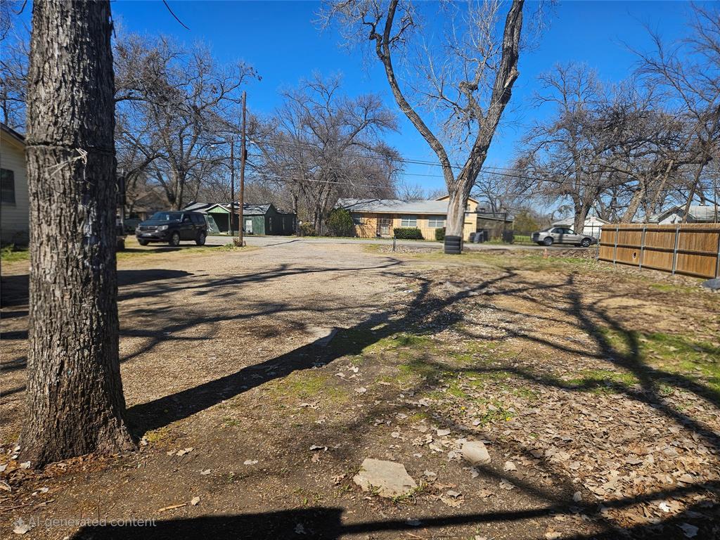 4422 North Ottawa Road Dallas, TX 75212 - Photo 2 of 6 a view of a yard with large trees