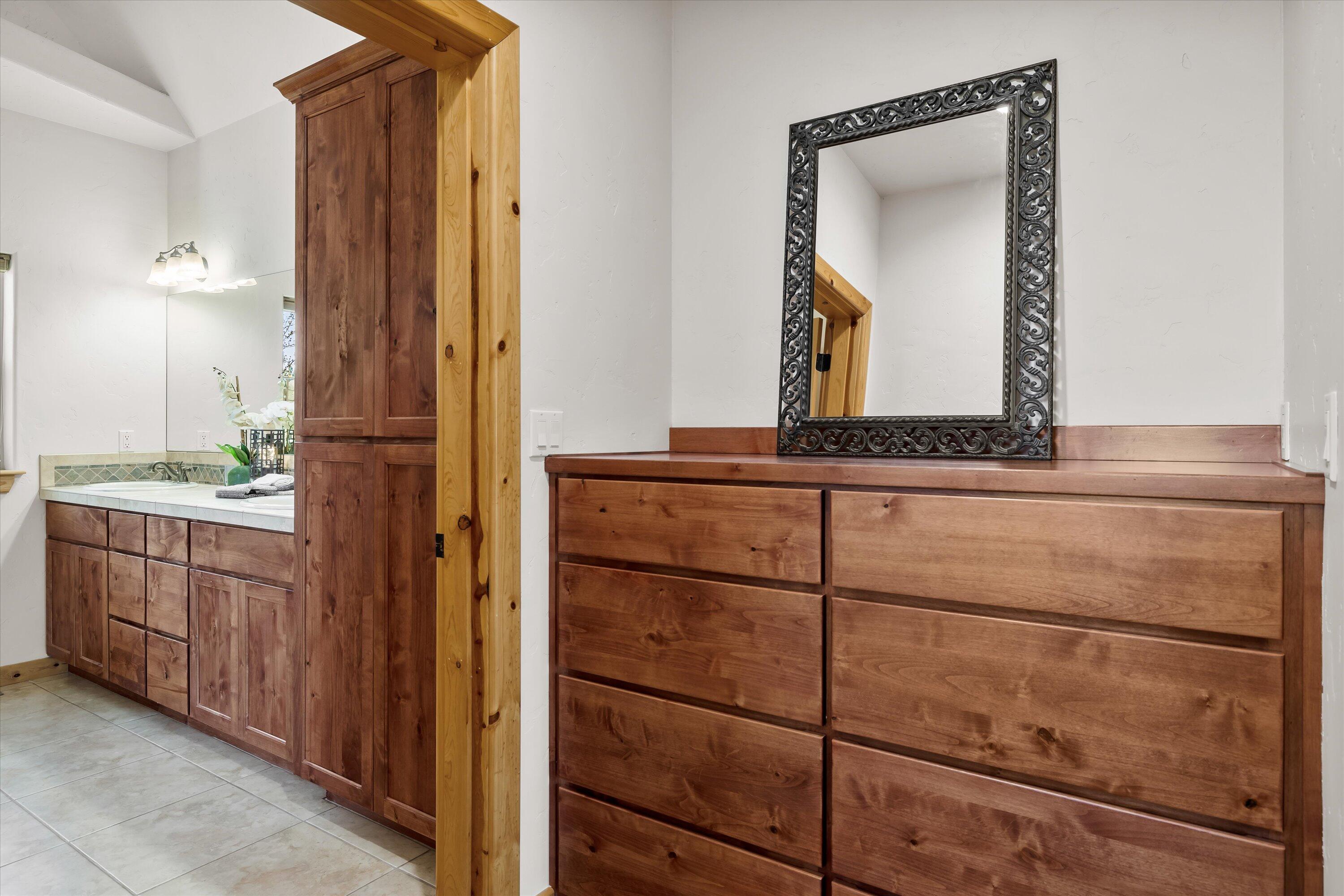 69125 Hurtley Ranch Road Sisters, OR 97759 - Photo 25 of 77 Built in bureau is located between the spacious walk-in closet and entrance to spa-like primary bath.