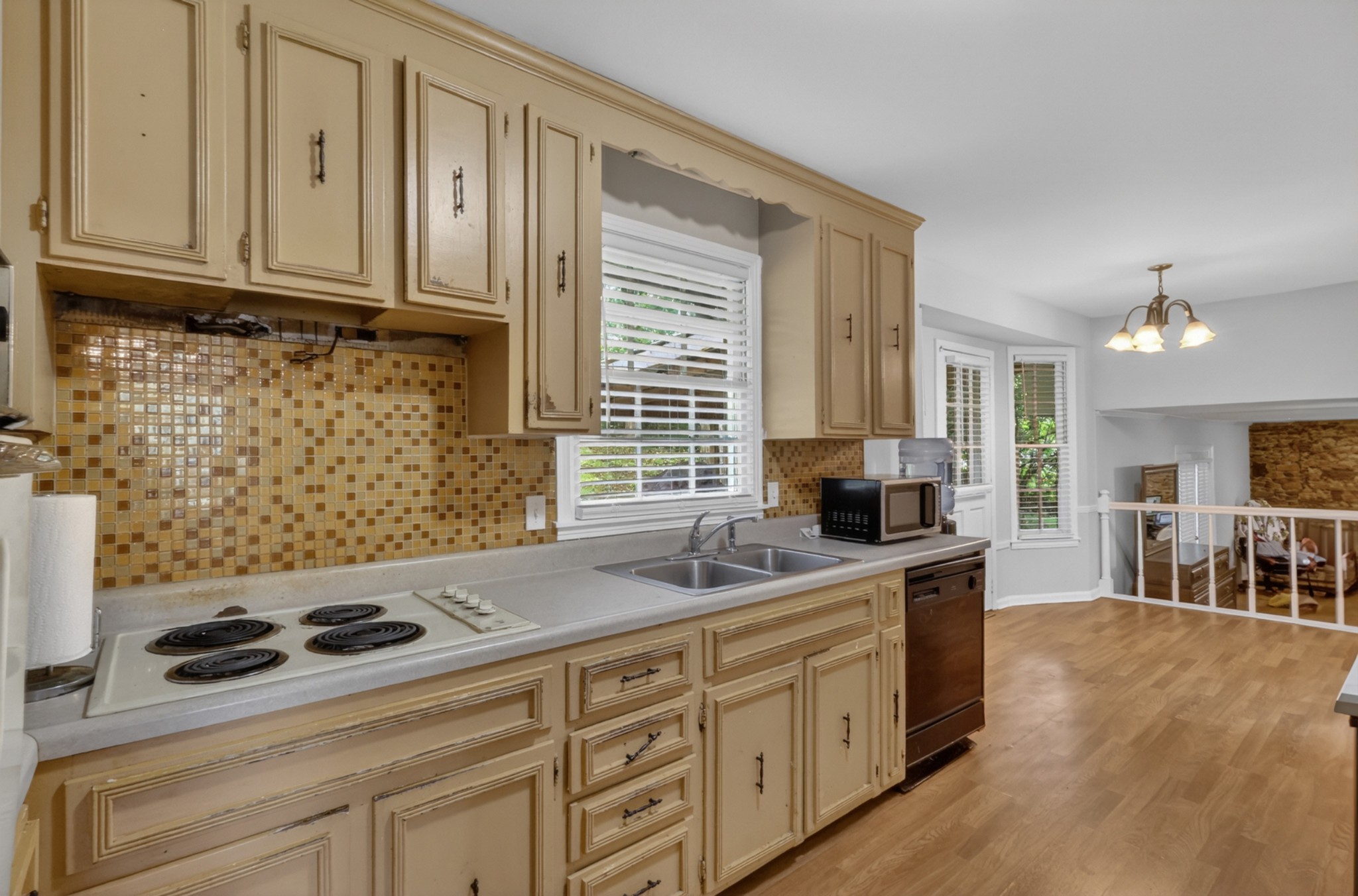 489 Canton Pass Madison, TN 37115 - Photo 7 of 25 a kitchen with stainless steel appliances a stove a sink a refrigerator and cabinets