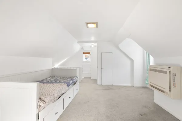 a bathroom with a bathtub and a sink