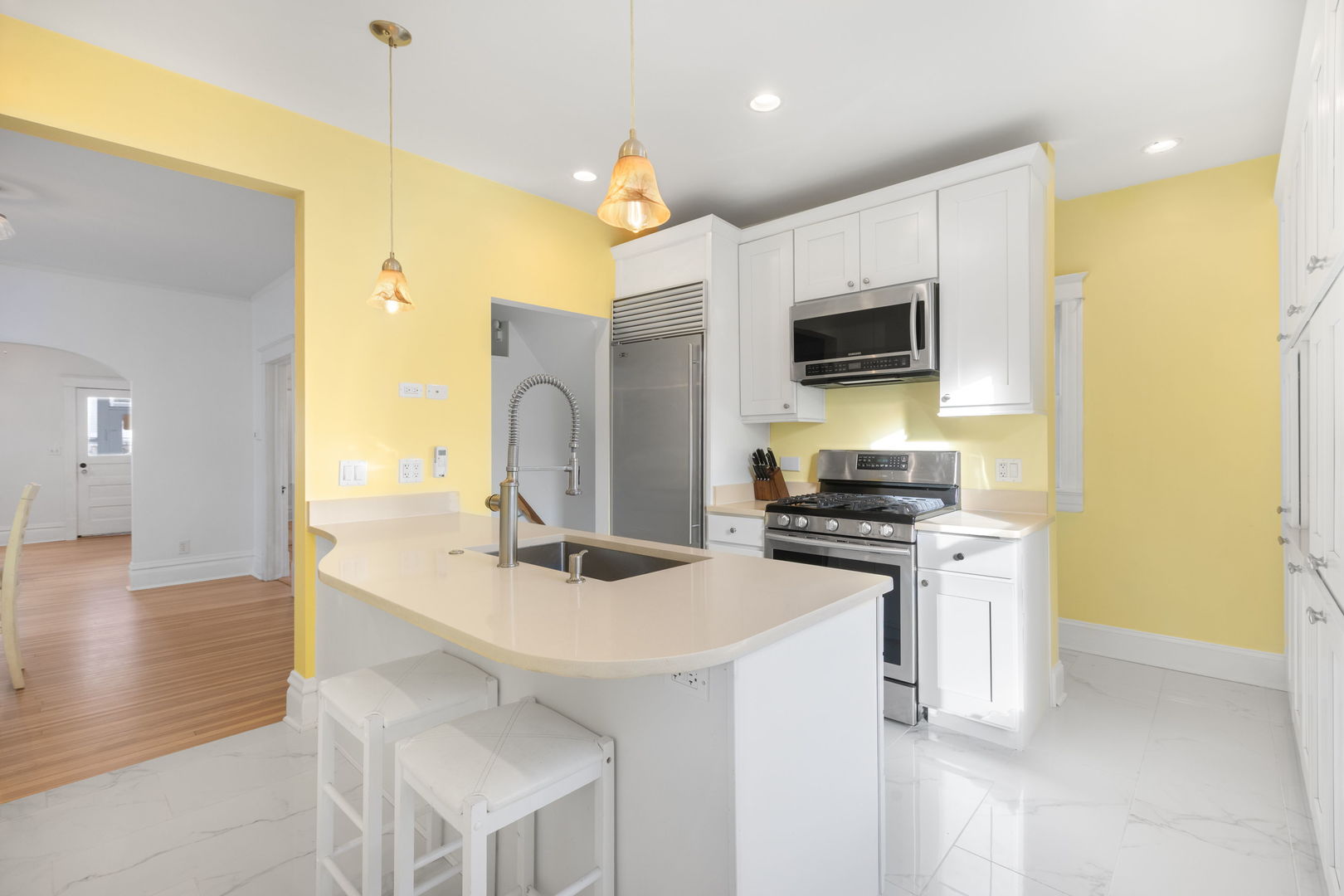 331 Granby Road Lake Forest, IL 60045 - Photo 9 of 23 a kitchen that has a sink and a stove top oven