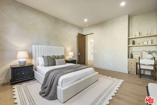 a view of a patio with a dining table chairs and a patio