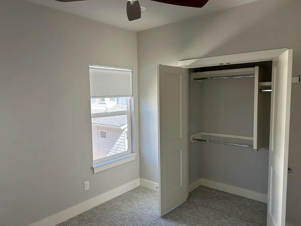 2209 Willow Street, Unit B Austin, TX 78702 - Photo 13 of 16 a view of an empty room with a window