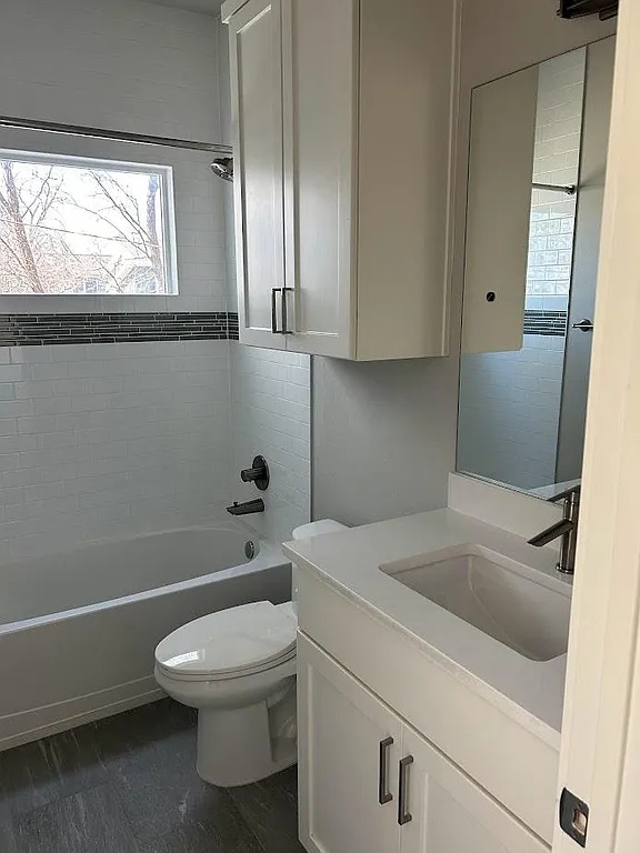 2209 Willow Street, Unit B Austin, TX 78702 - Photo 7 of 16 a bathroom with a sink a toilet and shower