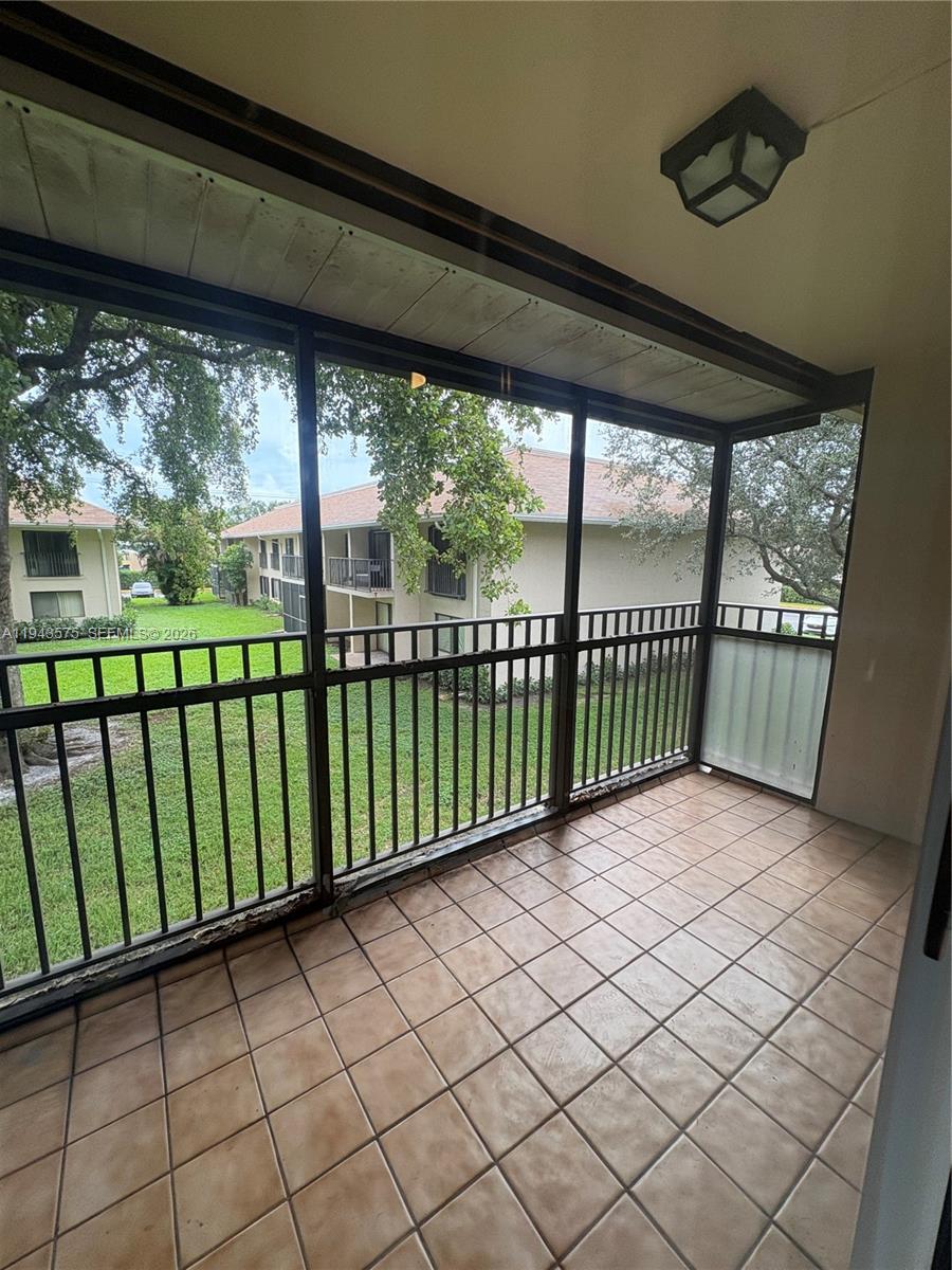 5981 Washington Street, Unit 215 Hollywood, FL 33023 - Photo 21 of 24 a view of a backyard