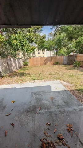 a view of beach and a yard