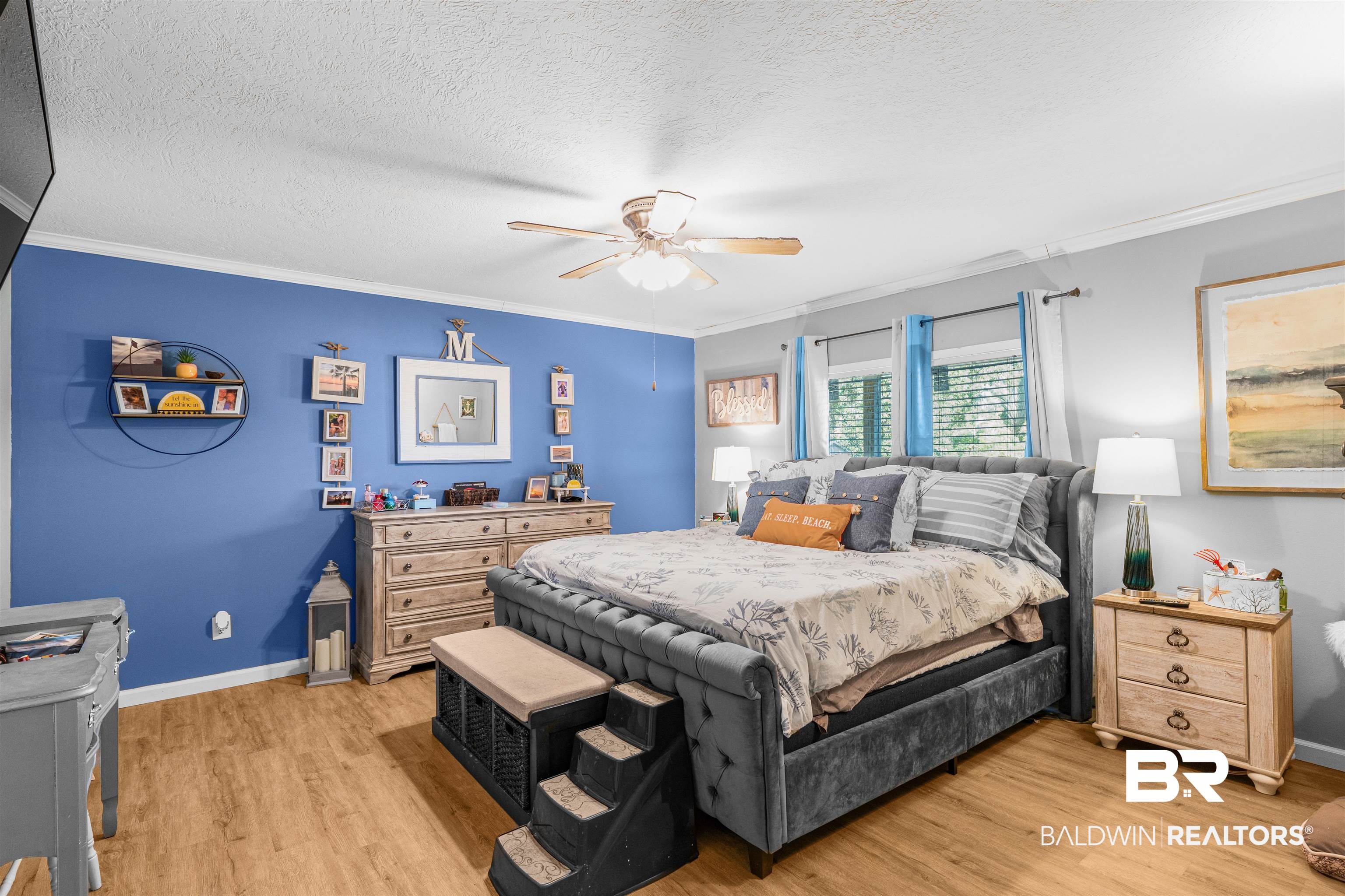 6921 Piney Woods Road Foley, AL 36535 - Photo 15 of 44 Bedroom with light hardwood / wood-style floors, ornamental molding, a textured ceiling, and ceiling fan