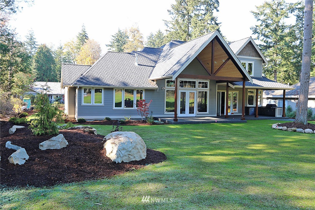 8826 Goshawk Road Blaine, WA 98230 - Photo 23 of 24 a view of a house with a backyard