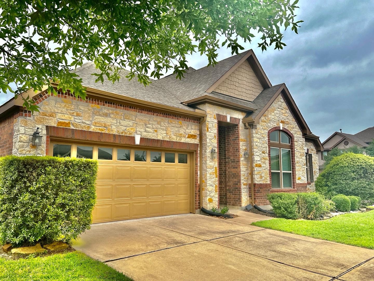 1110 Penny Ranch Lane Katy, TX 77494 - Photo 2 of 31 a front view of a house with garden