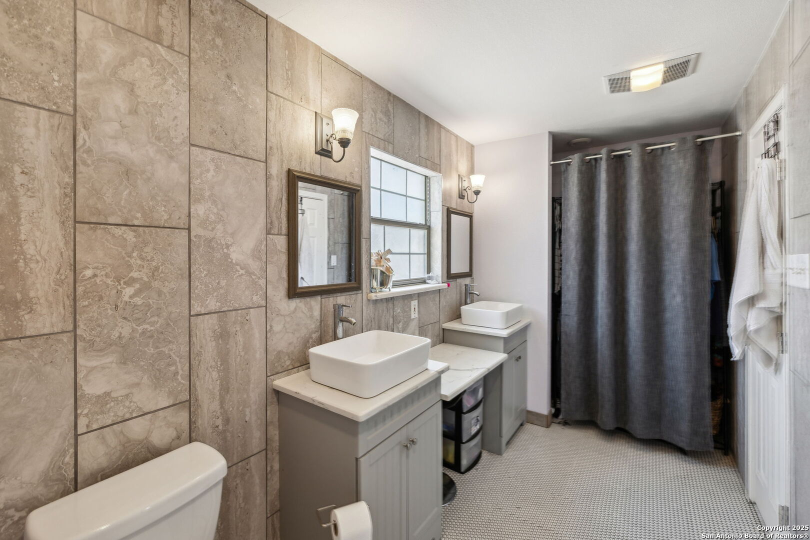 2355 Stuart Road Adkins, TX 78101 - Photo 23 of 46 a bathroom with a sink a toilet and shower