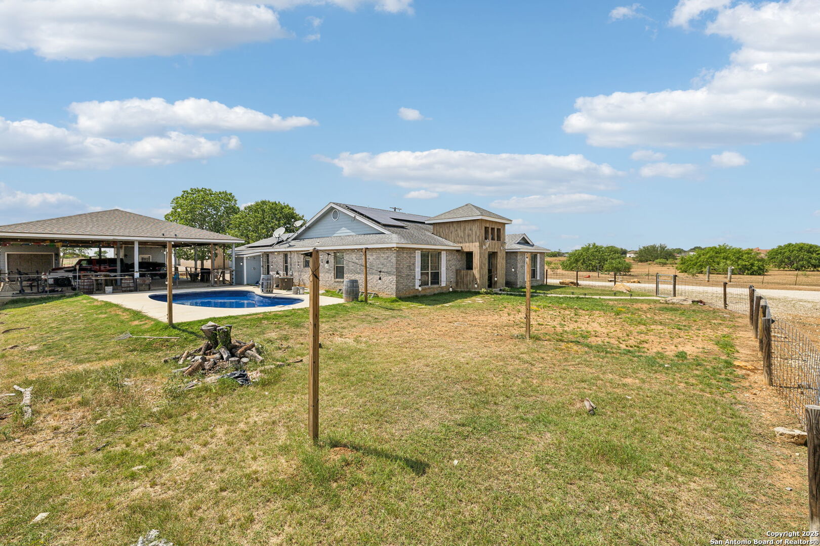 2355 Stuart Road Adkins, TX 78101 - Photo 30 of 46 a view of a lake with a house in the background