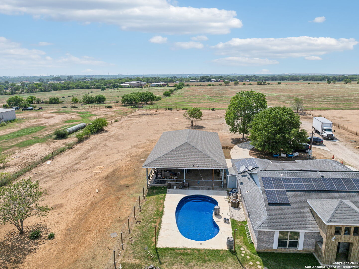 2355 Stuart Road Adkins, TX 78101 - Photo 37 of 46 an aerial view of a house with outdoor space and lake view