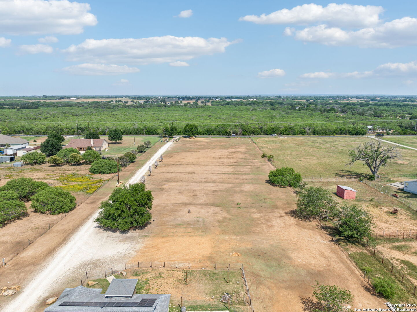 2355 Stuart Road Adkins, TX 78101 - Photo 41 of 46 a view of a garden with lawn chairs
