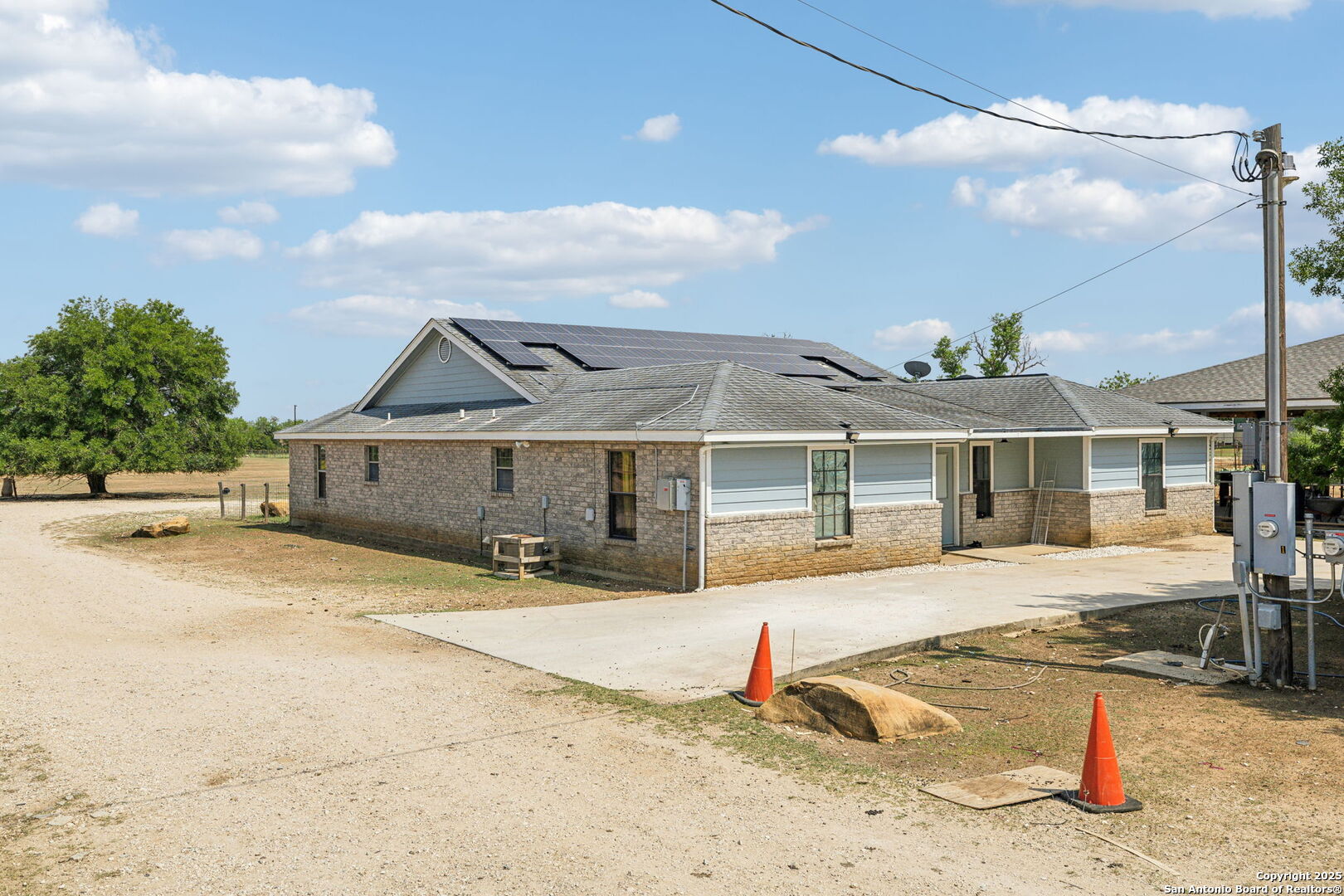 2355 Stuart Road Adkins, TX 78101 - Photo 43 of 46 a front view of a house with a yard