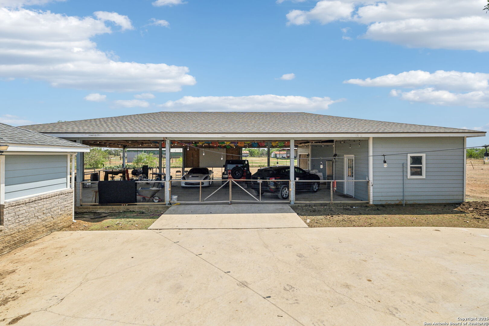 2355 Stuart Road Adkins, TX 78101 - Photo 44 of 46 a view of a house with sitting area and swimming pool