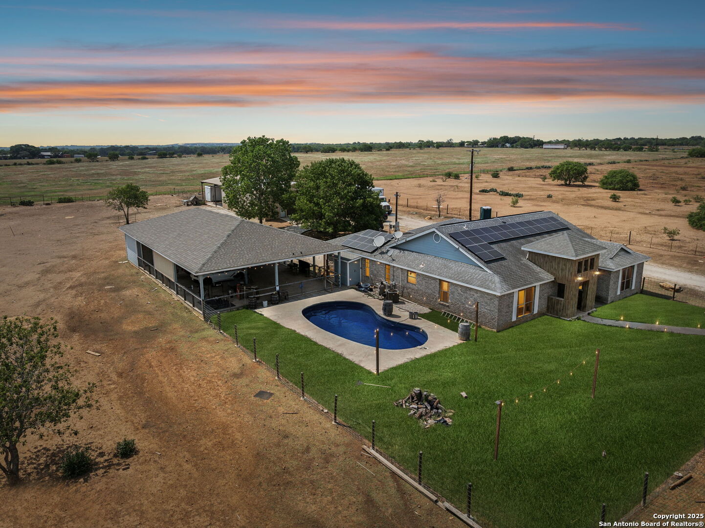 2355 Stuart Road Adkins, TX 78101 - Photo 46 of 46 an aerial view of a house with garden space and ocean view