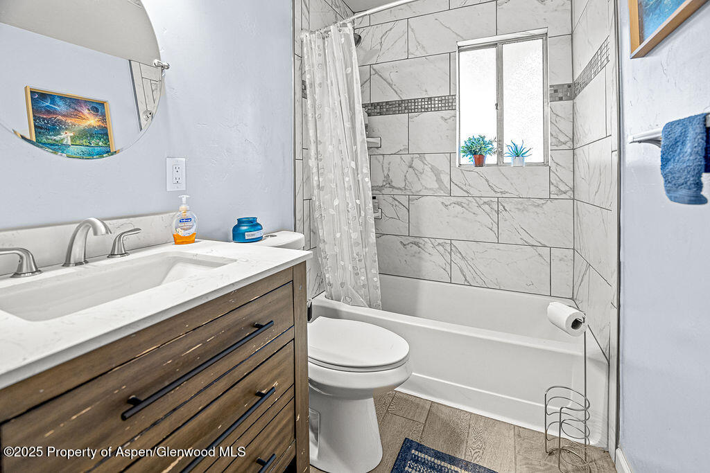 834 Ashley Road Craig, CO 81625 - Photo 23 of 38 a bathroom with a sink toilet and shower