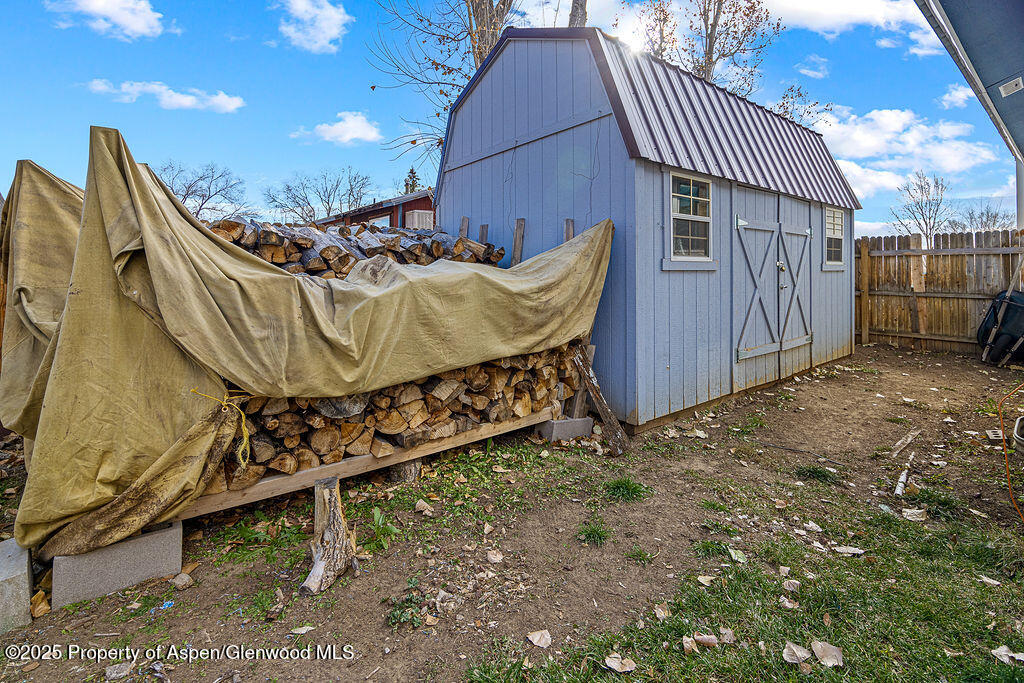 834 Ashley Road Craig, CO 81625 - Photo 26 of 38 a view of a backyard with furniture and entertaining space