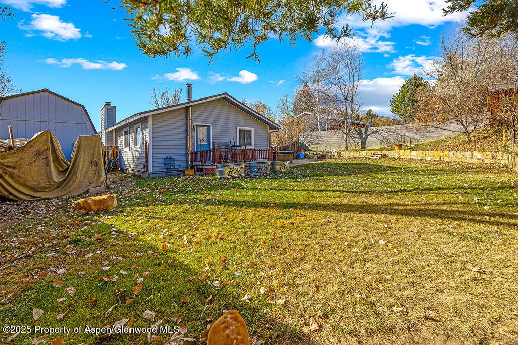 834 Ashley Road Craig, CO 81625 - Photo 28 of 38 a front view of a house with a garden