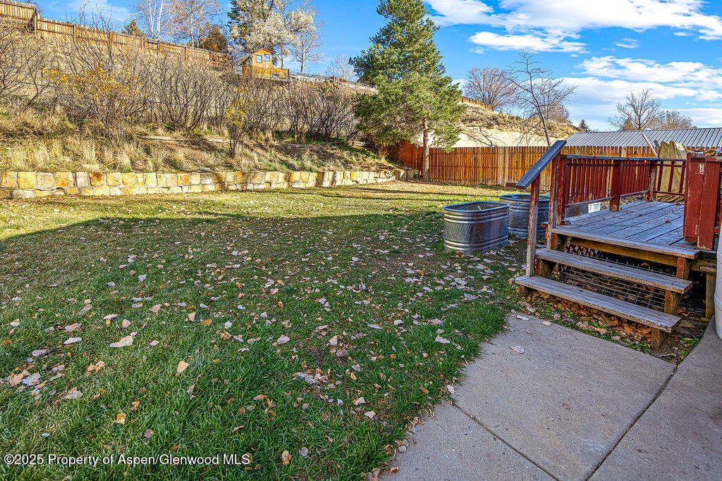 834 Ashley Road Craig, CO 81625 - Photo 31 of 38 a view of a yard with an outdoor space