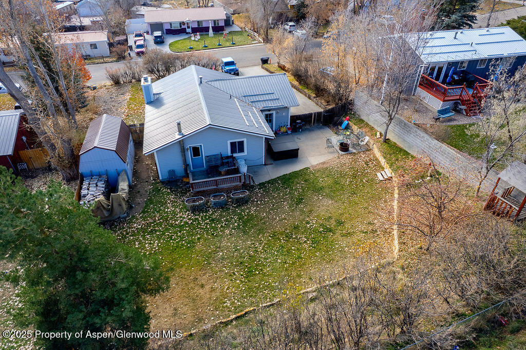 834 Ashley Road Craig, CO 81625 - Photo 34 of 38 an aerial view of a house with a garden and plants