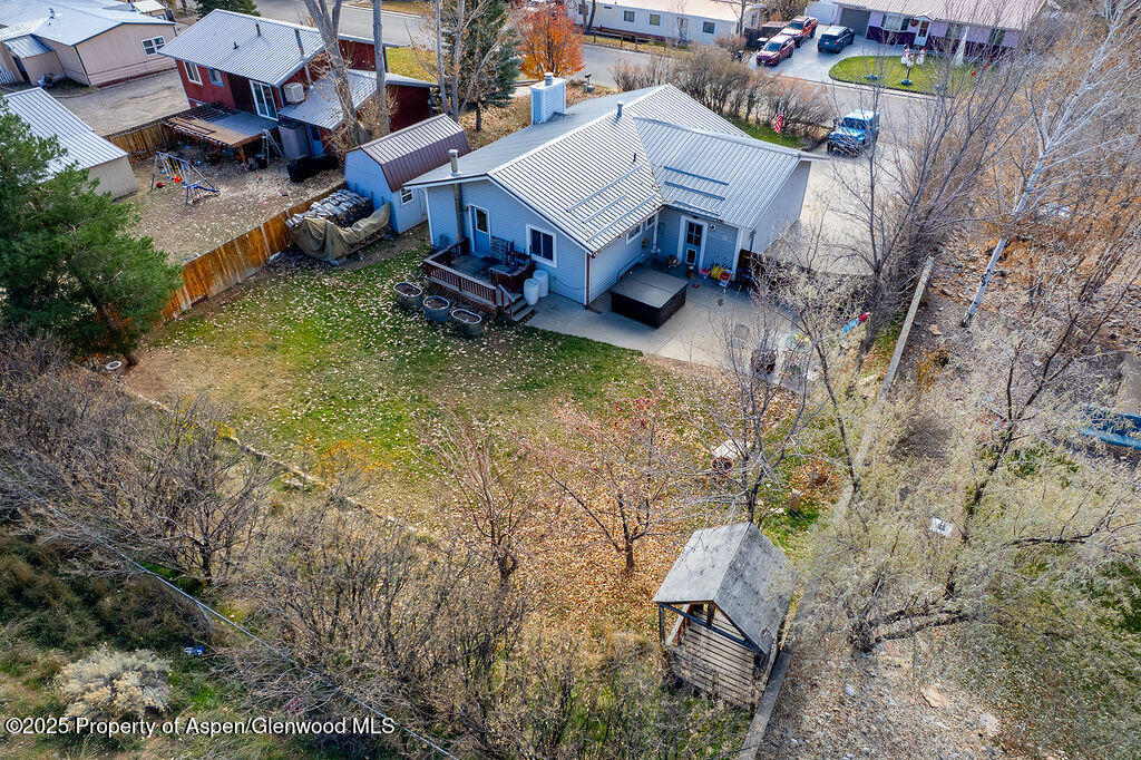 834 Ashley Road Craig, CO 81625 - Photo 35 of 38 a view of a house with a yard