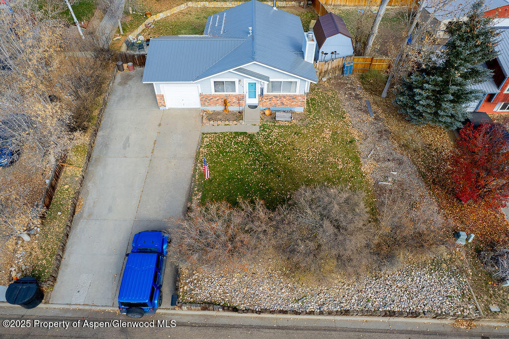834 Ashley Road Craig, CO 81625 - Photo 37 of 38 a front view of a house with a yard