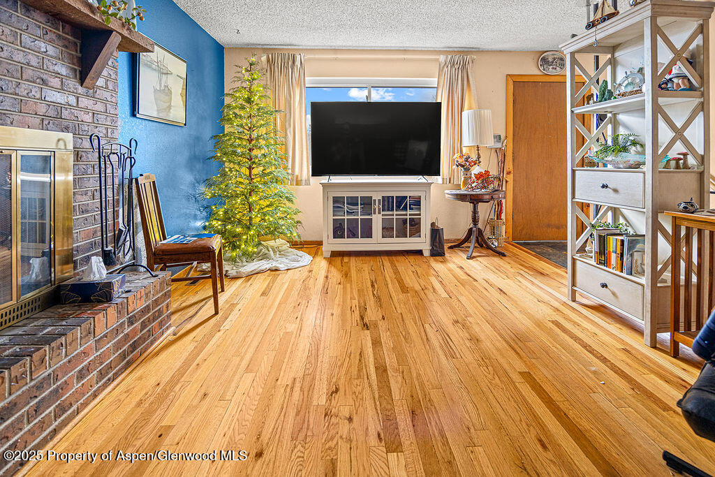 834 Ashley Road Craig, CO 81625 - Photo 9 of 38 a view of a living room and a flat screen tv