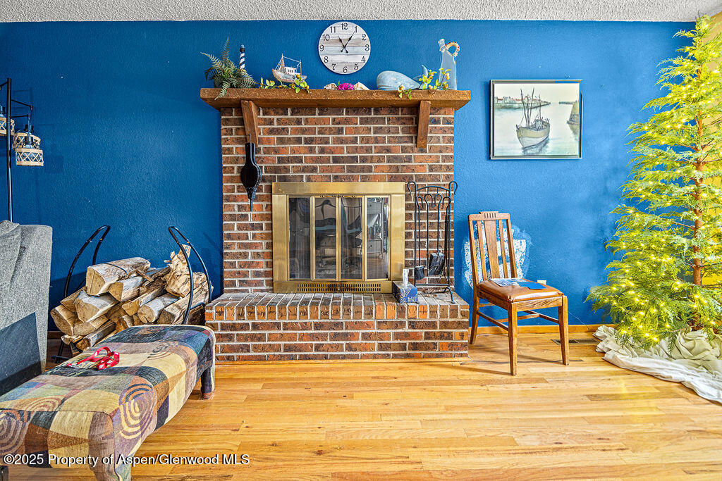 834 Ashley Road Craig, CO 81625 - Photo 10 of 38 a bedroom with a bed and a chair