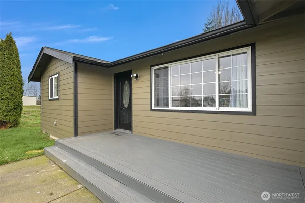 a house view with a backyard space