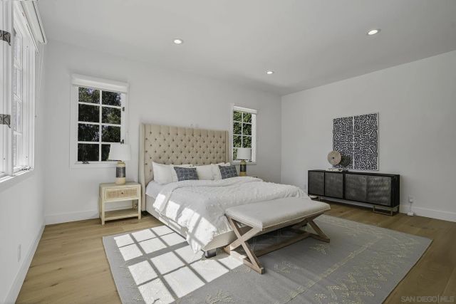 an aerial view of a house with yard swimming pool and outdoor seating