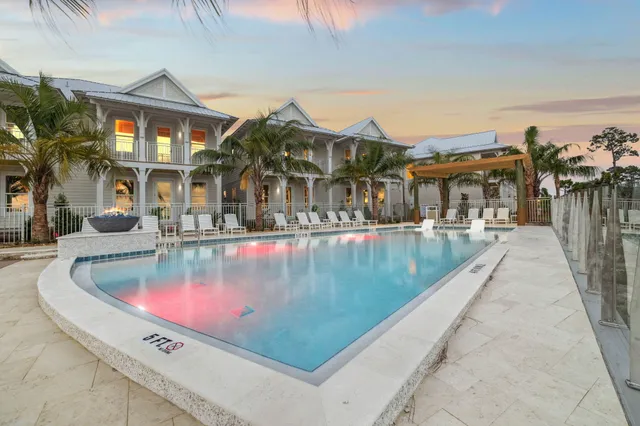 a kitchen with kitchen island a stove a sink a center island and a center island