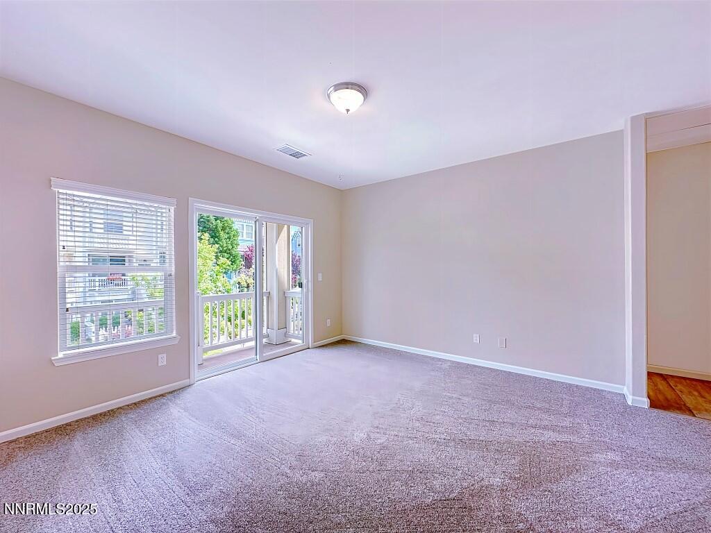 2180 Alamo Square Way Reno, NV 89509 - Photo 14 of 34 a view of an empty room with a window