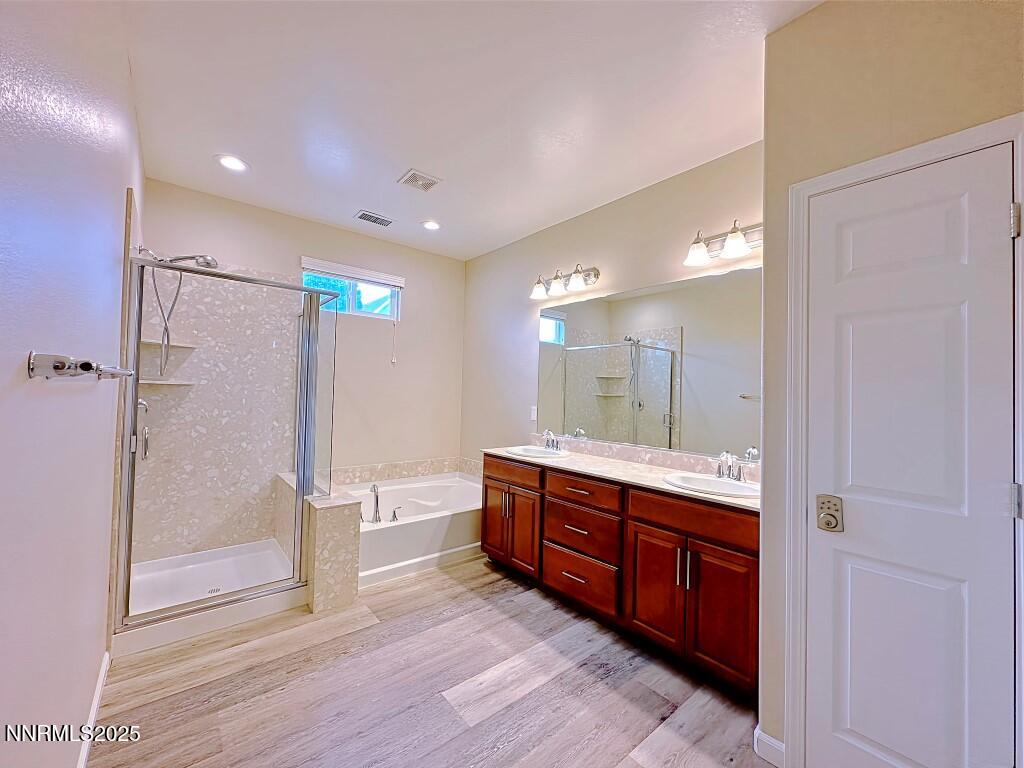 2180 Alamo Square Way Reno, NV 89509 - Photo 17 of 34 a bathroom with a double vanity sink and a mirror