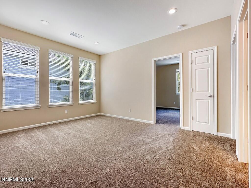 2180 Alamo Square Way Reno, NV 89509 - Photo 19 of 34 a view of an empty room with a window