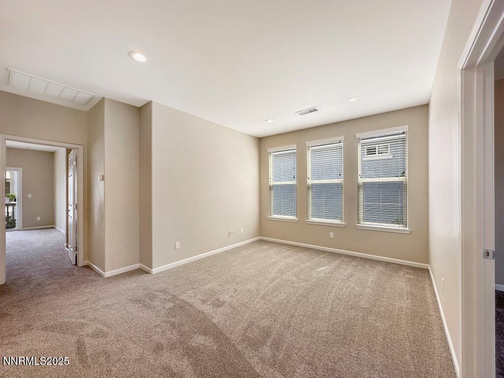 2180 Alamo Square Way Reno, NV 89509 - Photo 21 of 34 a view of an empty room with a window