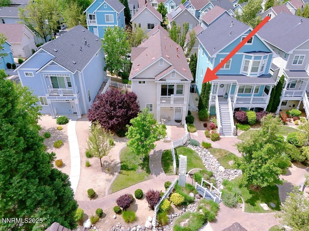 2180 Alamo Square Way Reno, NV 89509 - Photo 27 of 34 an aerial view of multiple houses with a yard