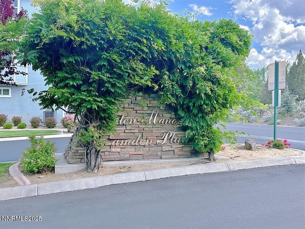 2180 Alamo Square Way Reno, NV 89509 - Photo 32 of 34 a sign board with flower plants and large trees