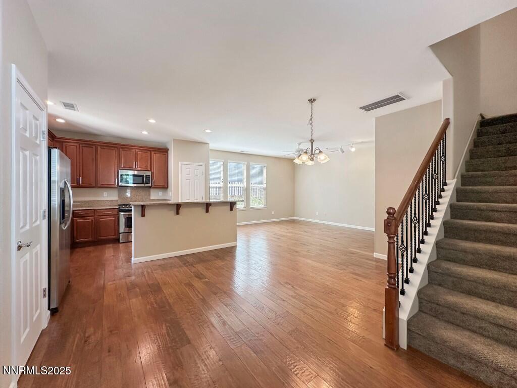 2180 Alamo Square Way Reno, NV 89509 - Photo 5 of 34 a view of kitchen with wooden floor and electronic appliances