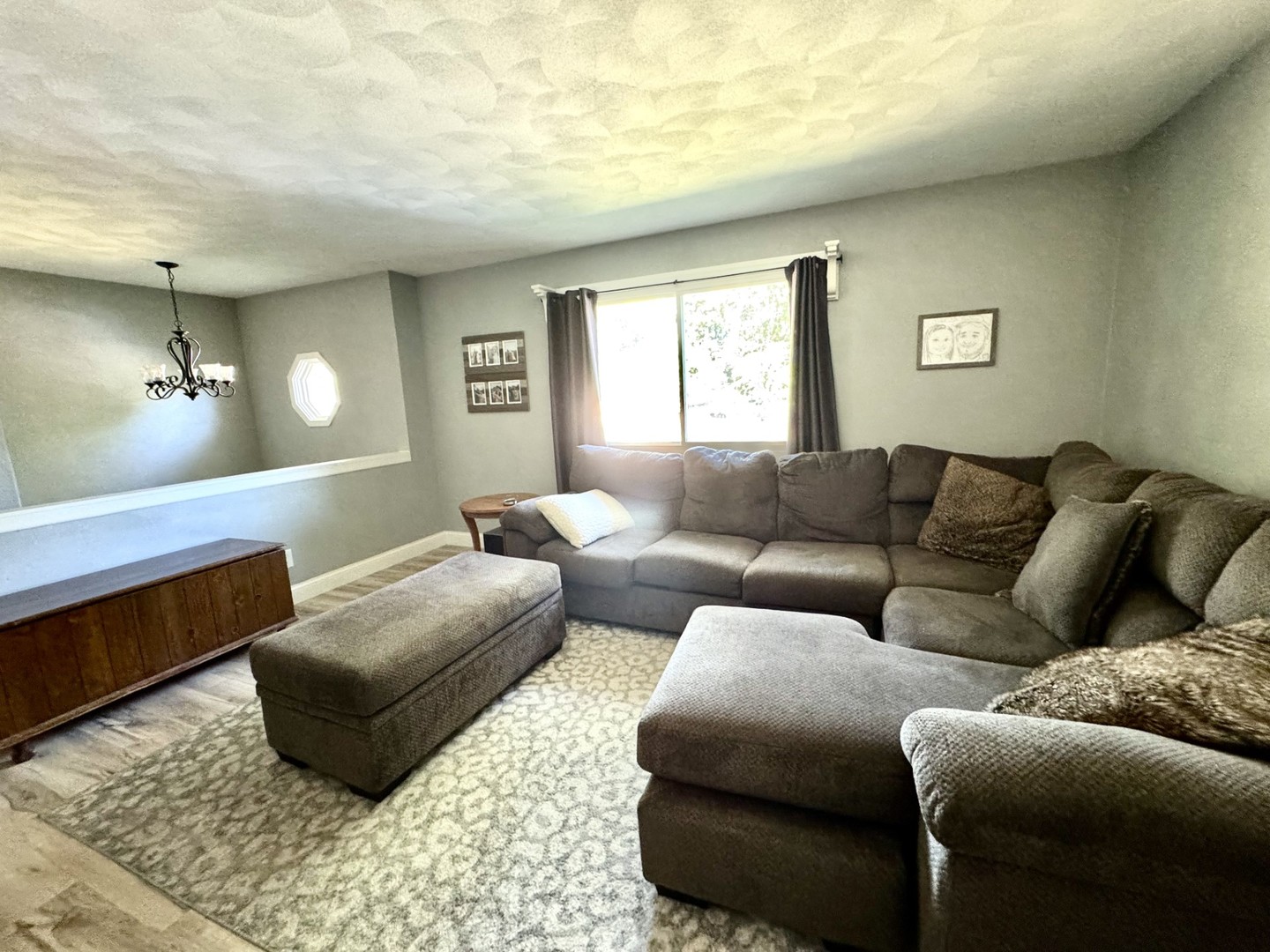 1015 South Maple Street Bloomington, IL 61701 - Photo 3 of 20 a living room with furniture and a window