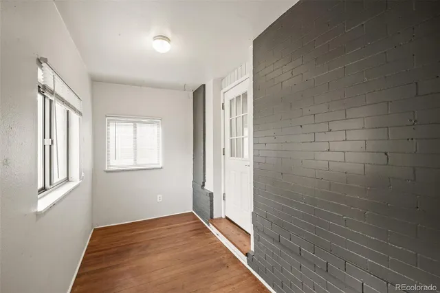 a view of hallway with a window