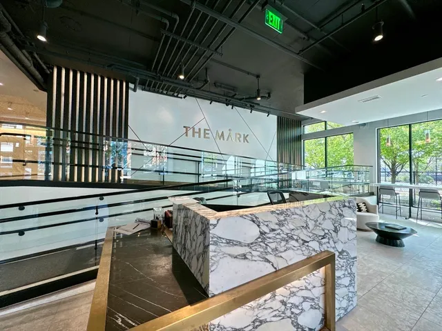a view of a patio with table and chairs with wooden floor