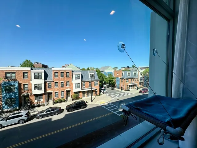 a view of a living room and dining room