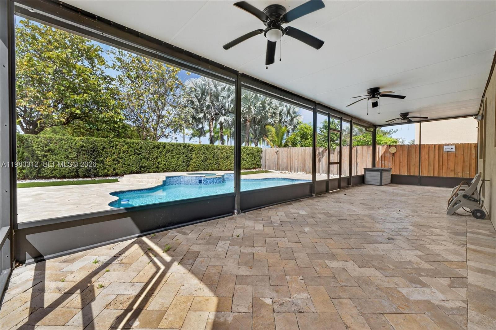 11561 Southwest 232nd Lane, Unit 11561 Homestead, FL 33032 - Photo 21 of 61 a view of a room with a large window