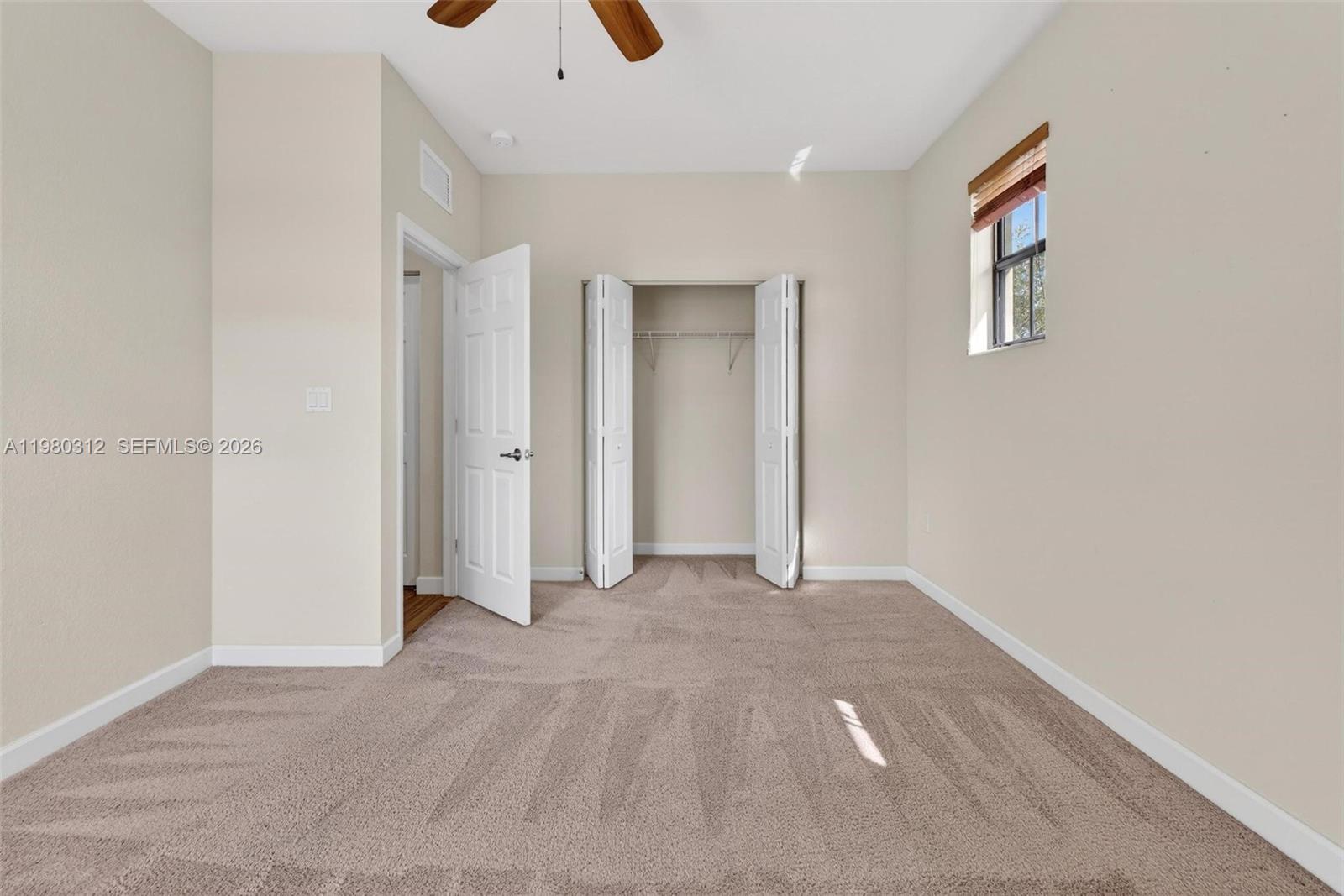 11561 Southwest 232nd Lane, Unit 11561 Homestead, FL 33032 - Photo 46 of 61 a view of an empty room