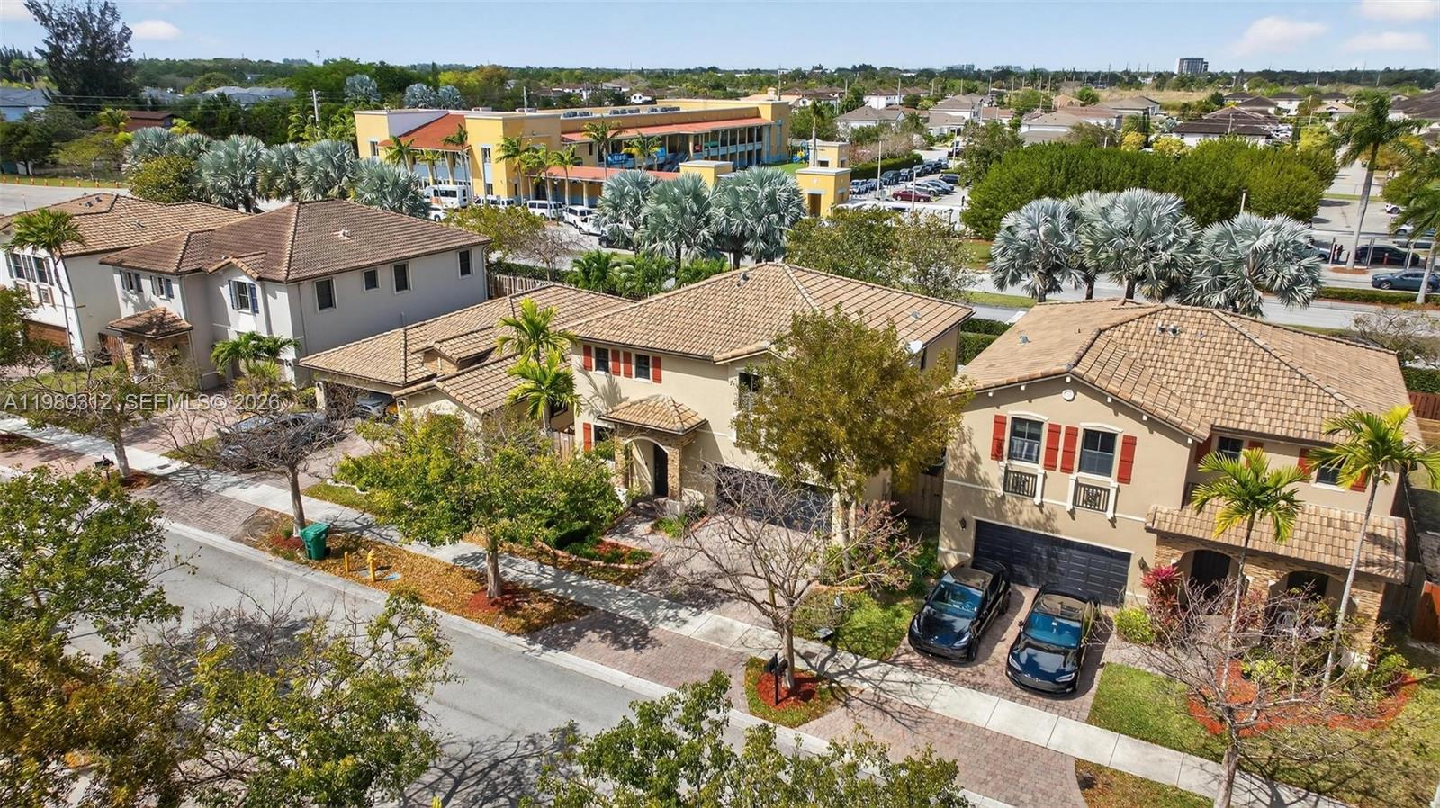 11561 Southwest 232nd Lane, Unit 11561 Homestead, FL 33032 - Photo 54 of 61 an aerial view of multiple house