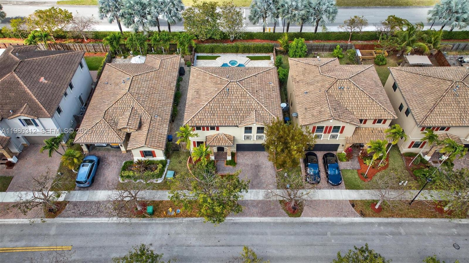 11561 Southwest 232nd Lane, Unit 11561 Homestead, FL 33032 - Photo 55 of 61 an aerial view of multiple house