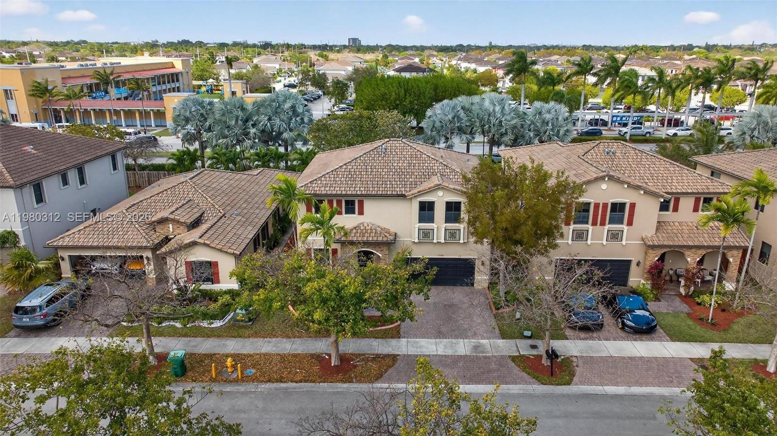 11561 Southwest 232nd Lane, Unit 11561 Homestead, FL 33032 - Photo 56 of 61 an aerial view of multiple house